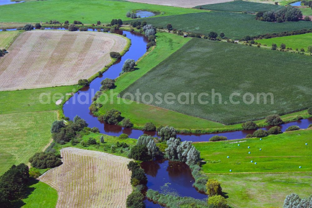 Aerial image Unterlüß - Meandering, serpentine curve of river of Aller in Unterluess in the state Lower Saxony, Germany