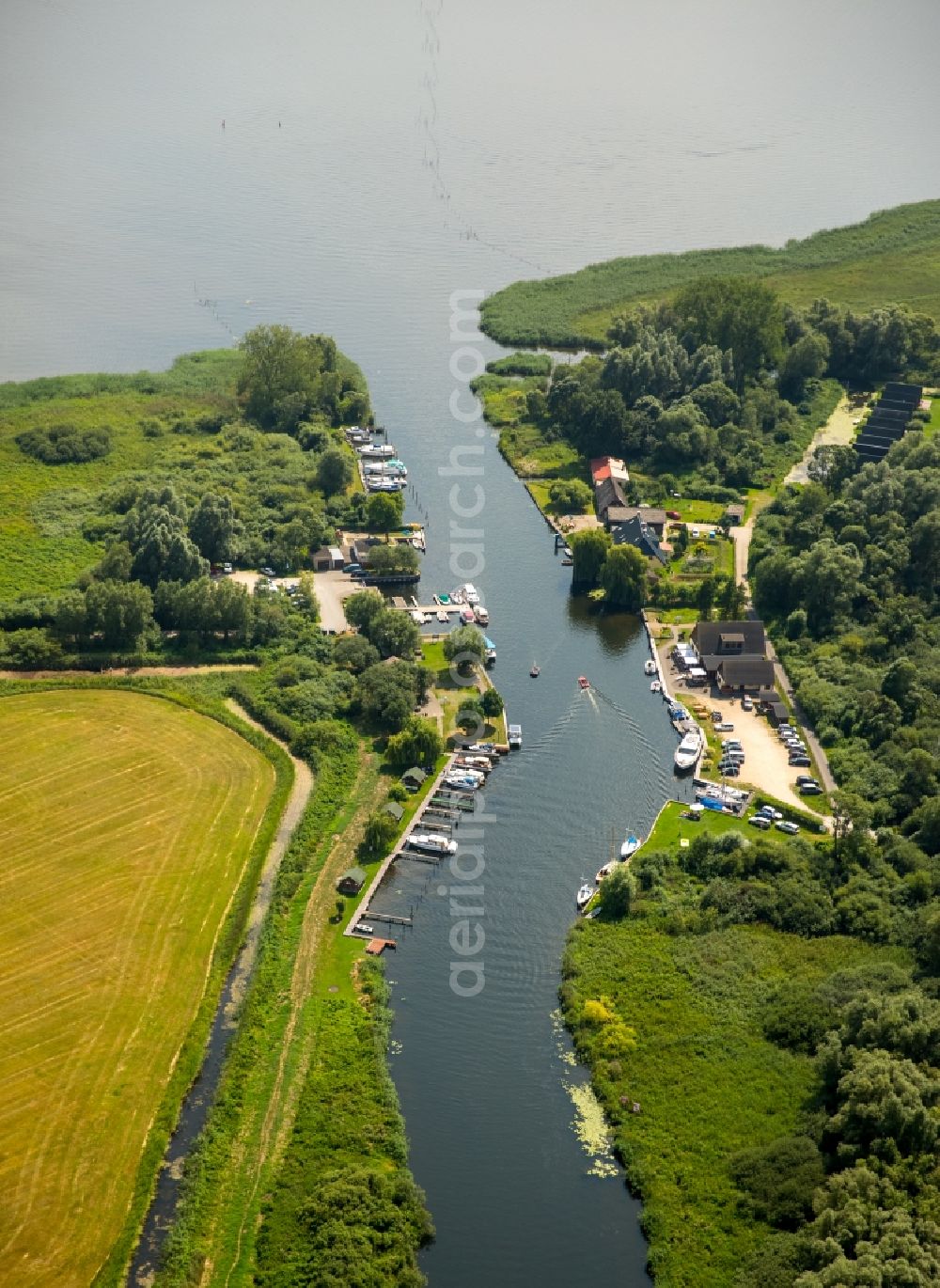 Dargun from above - River origin of the river Peene at the lake Kummerower See with water wan der rest area Aalbude in Dargun in the state Mecklenburg - Western Pomerania