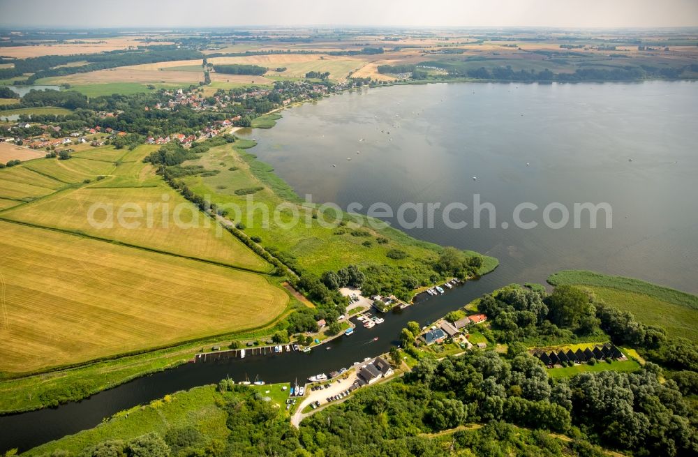 Aerial image Dargun - River origin of the river Peene at the lake Kummerower See with water wan der rest area Aalbude in Dargun in the state Mecklenburg - Western Pomerania