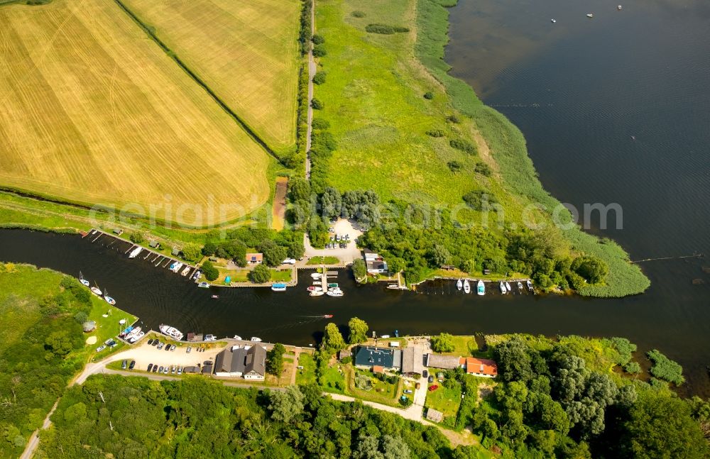 Dargun from above - River origin of the river Peene at the lake Kummerower See with water wan der rest area Aalbude in Dargun in the state Mecklenburg - Western Pomerania