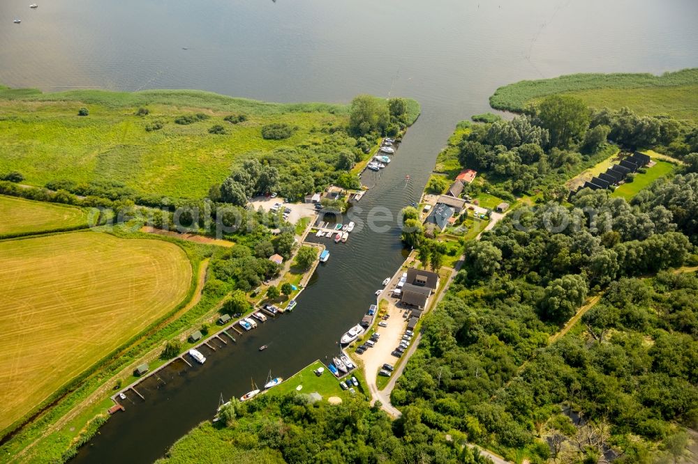 Dargun from above - River origin of the river Peene at the lake Kummerower See with water wan der rest area Aalbude in Dargun in the state Mecklenburg - Western Pomerania