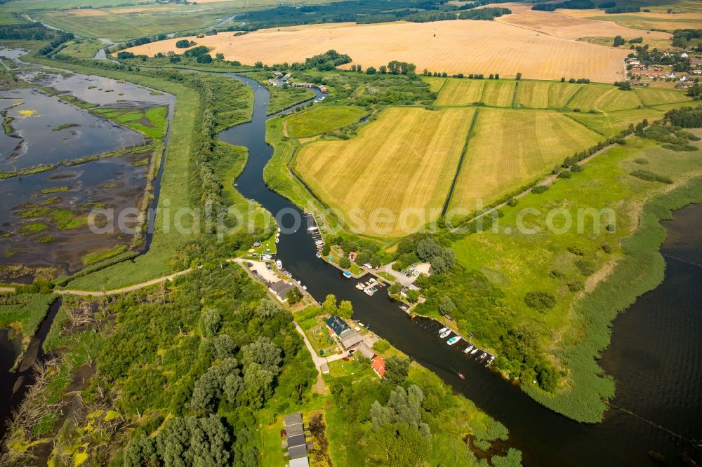 Aerial image Dargun - River origin of the river Peene at the lake Kummerower See with water wan der rest area Aalbude in Dargun in the state Mecklenburg - Western Pomerania