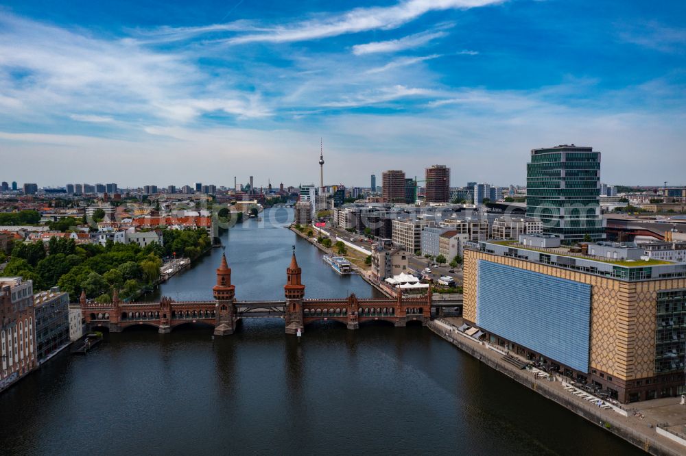 Aerial image Berlin - River - bridge construction Oberbaumbruecke for crossing the Spree in the district Friedrichshain in Berlin, Germany