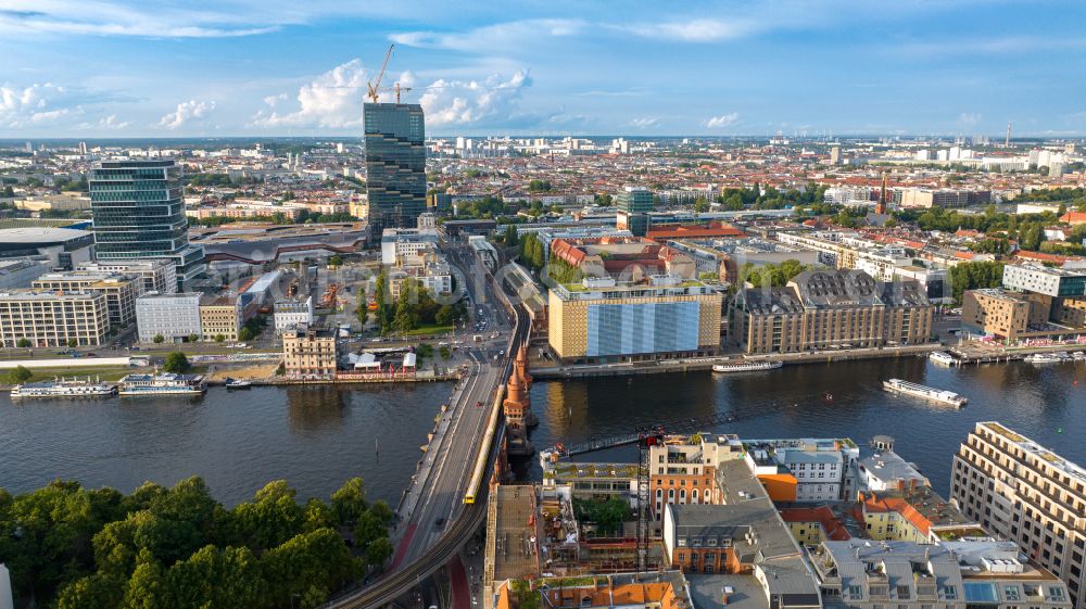 Aerial photograph Berlin - River - bridge construction Oberbaumbruecke for crossing the Spree in the district Friedrichshain in Berlin, Germany