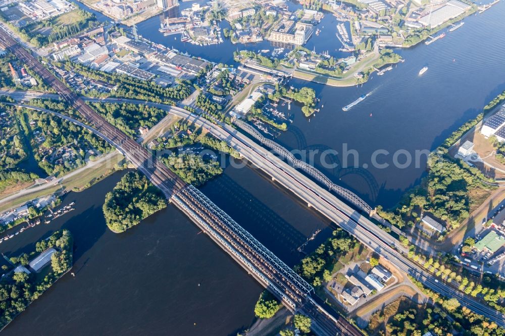 Aerial photograph Hamburg - River - bridges: Old Elbe-bridge of Harburg, Bridge of the 17. June, Motorwaybridge of A253 and Railwaybridge crossing the southern Elbe in Hamburg, Germany