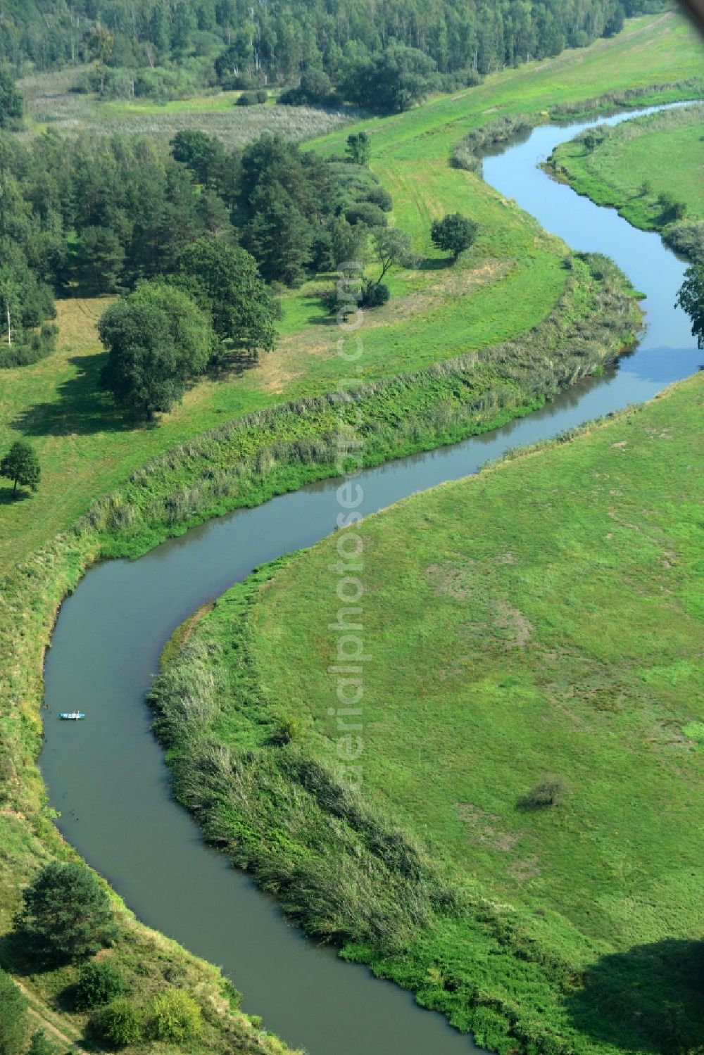 Jessen (Elster) from above - Course of and landscape surrounding the river of Schwarze Elster in Jessen (Elster) in the state of Saxony-Anhalt. The river takes its course through meadows and forest