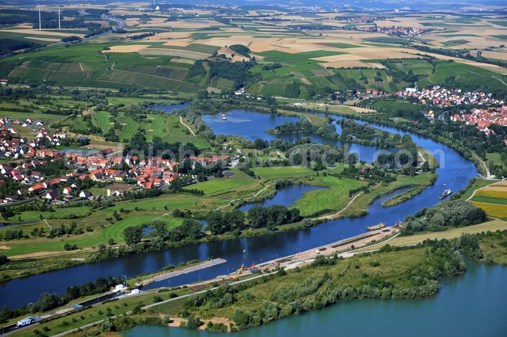 Dettelbach from the bird's eye view: View from east along the Main river with the district Mainsondheim of Dettelbach at the left riverside in the state Bavaria