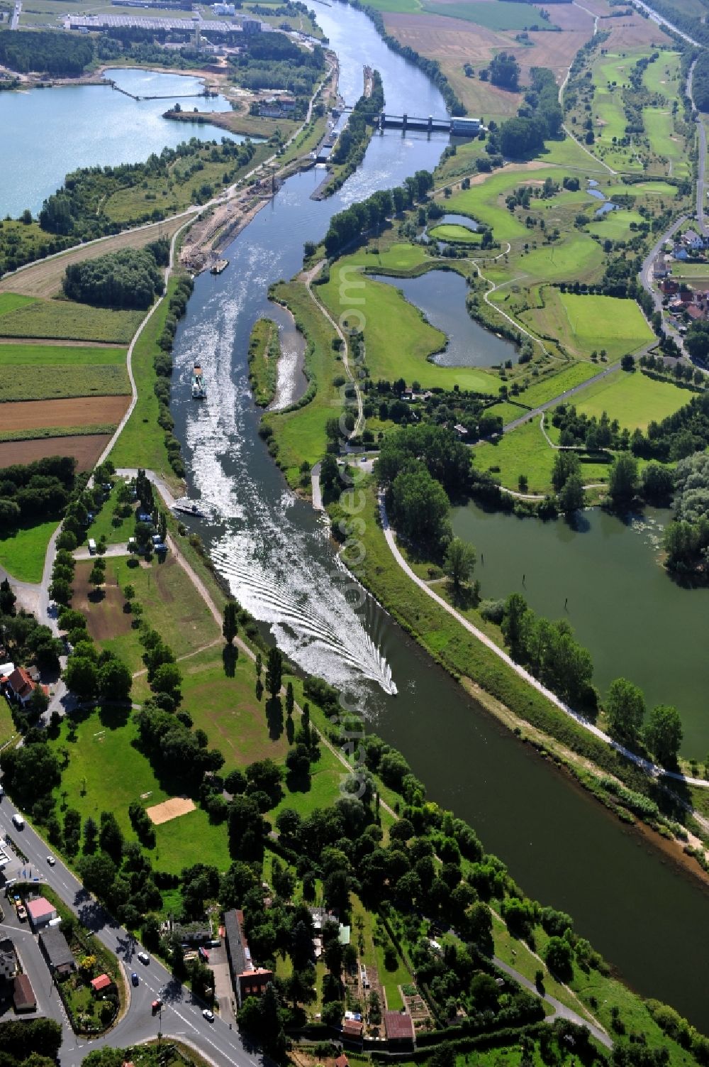 Dettelbach from above - View from west along the Main river with the lock Dettelbach and the district Mainsondheim at the left riverside in the state Bavaria