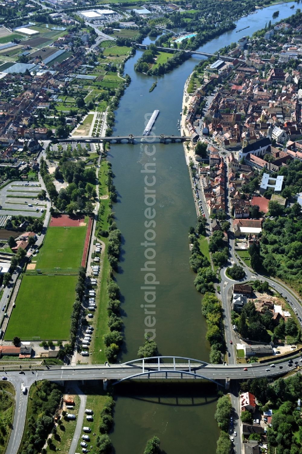 Aerial photograph Kitzingen - View from north along the Main river with the North Bridge, Pipins Bridge, Old Main Bridge, Konrad-Adenauer-Bridge and the open-air bath on the Mondsee Island in Kitzingen in the state Bavaria