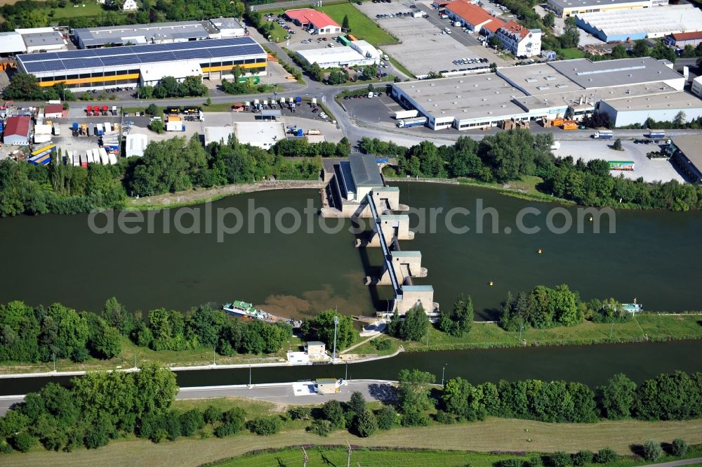 Kitzingen from the bird's eye view: View from southeast along the Main river with the lock Kitzingen in the state Bavaria