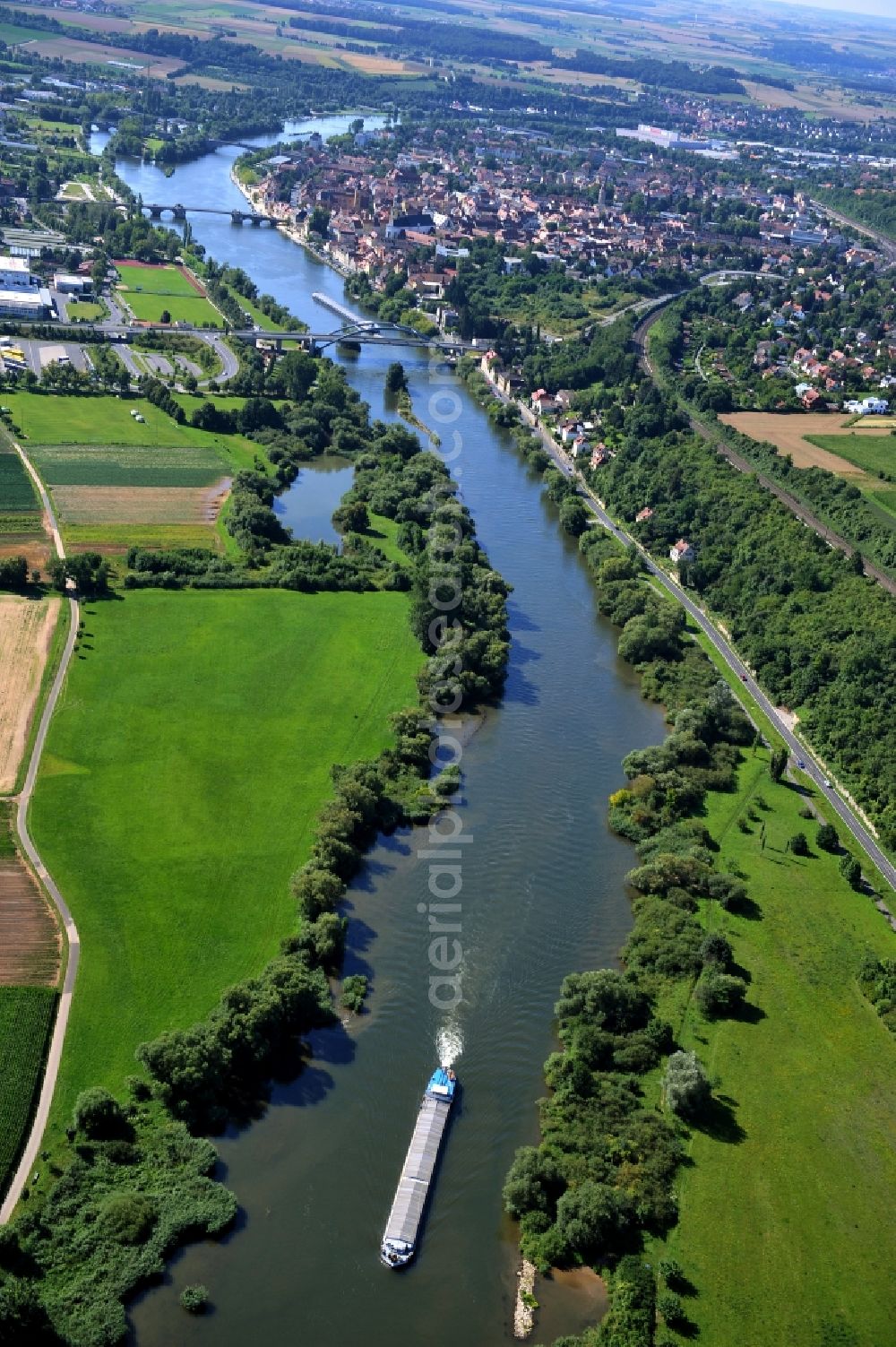 Kitzingen from the bird's eye view: View from north along the Main river with the North Bridge and Pipins Bridge, Old Main Bridge in Kitzingen in the state Bavaria