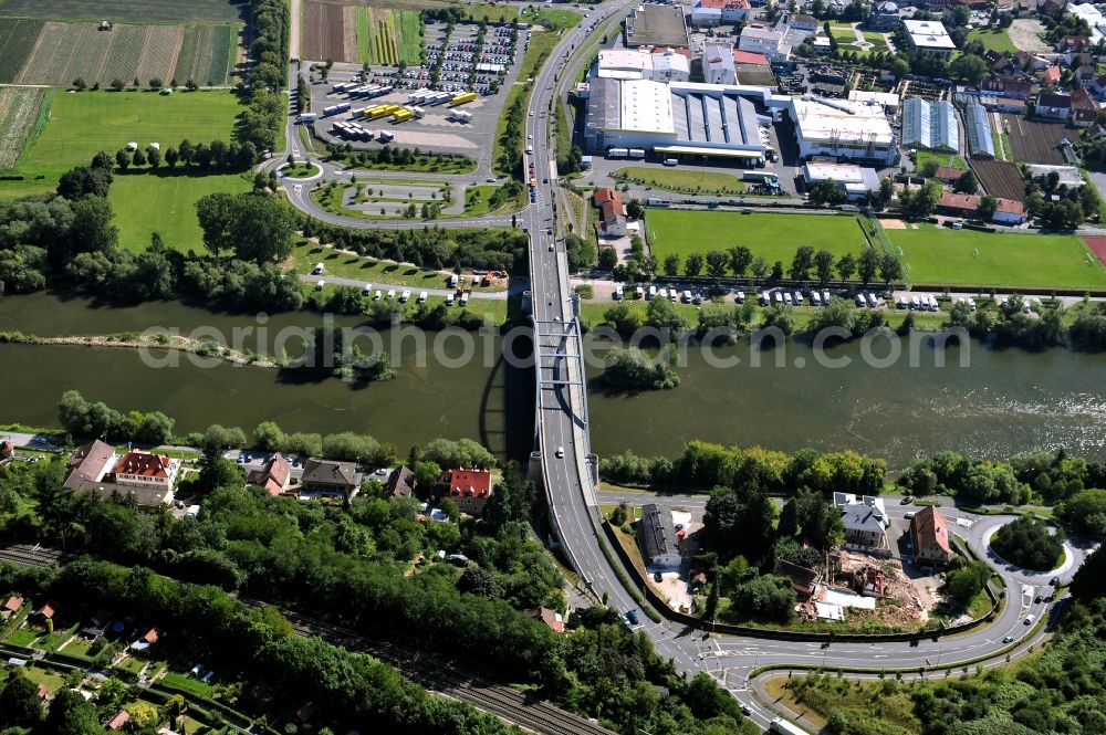 Kitzingen from the bird's eye view: View from west along the Main river with the North bridge in Kitzingen in the state Bavaria