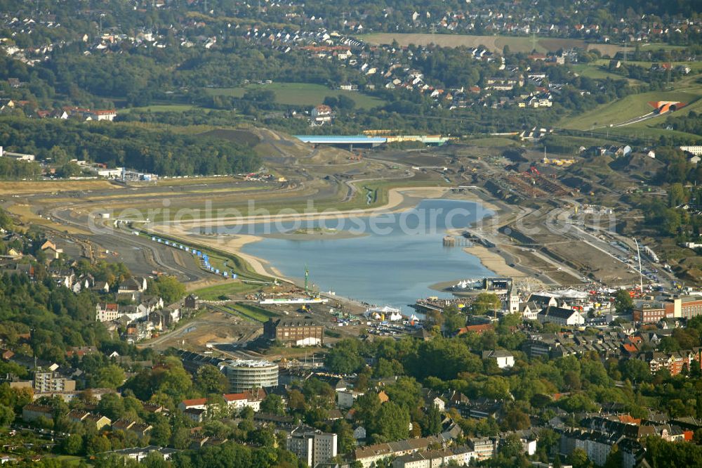 Dortmund from above - Beginn der Flutung des Phoenix-Sees im Stadtteil Hörde. Auf dem ehemaligen Gelände der Hermannshütte soll ein 24 Hektar großer See mit einer Länge von 1.230 Metern und einer Breite von 310 Metern entstehen. Beginning of the flooding of the lake Phoenix. On the former site of the ironworks Hermannshutte a 24 hectares large lake will be formed.