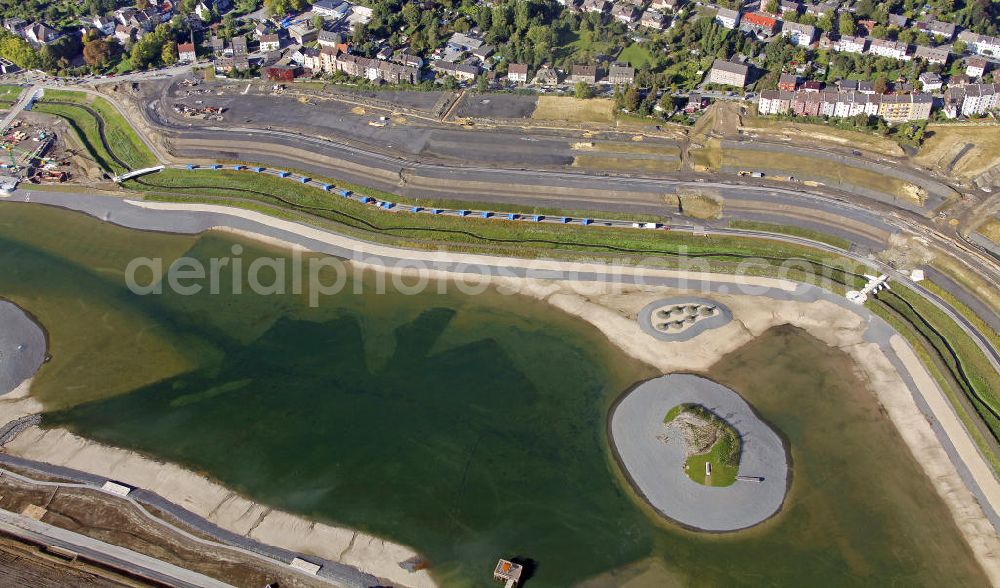 Aerial image Dortmund - Beginn der Flutung des Phoenix-Sees im Stadtteil Hörde. Auf dem ehemaligen Gelände der Hermannshütte soll ein 24 Hektar großer See mit einer Länge von 1.230 Metern und einer Breite von 310 Metern entstehen. Beginning of the flooding of the lake Phoenix. On the former site of the ironworks Hermannshutte a 24 hectares large lake will be formed.