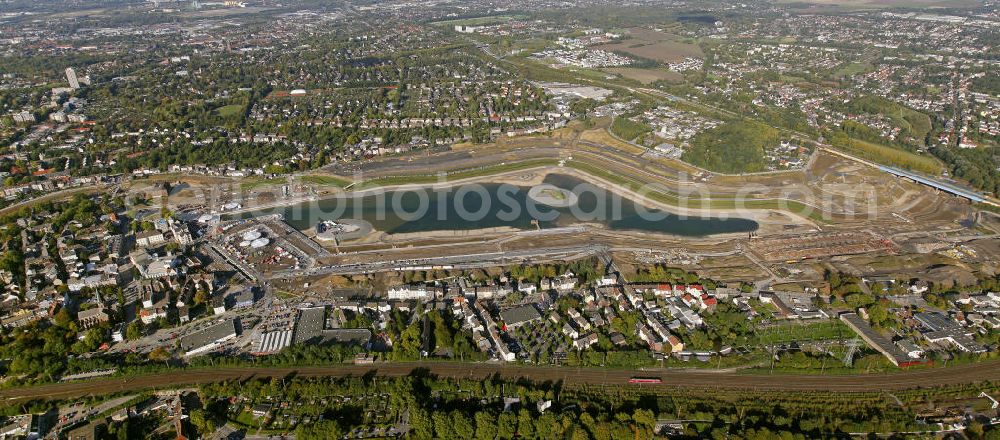 Aerial photograph Dortmund - Beginn der Flutung des Phoenix-Sees im Stadtteil Hörde. Auf dem ehemaligen Gelände der Hermannshütte soll ein 24 Hektar großer See mit einer Länge von 1.230 Metern und einer Breite von 310 Metern entstehen. Beginning of the flooding of the lake Phoenix. On the former site of the ironworks Hermannshutte a 24 hectares large lake will be formed.