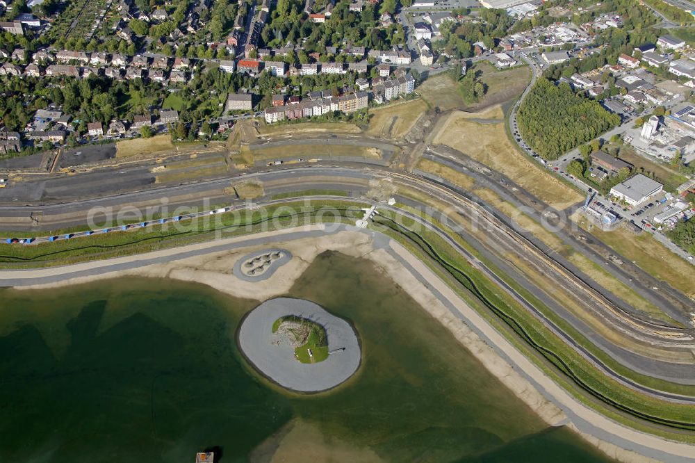 Dortmund from above - Beginn der Flutung des Phoenix-Sees im Stadtteil Hörde. Auf dem ehemaligen Gelände der Hermannshütte soll ein 24 Hektar großer See mit einer Länge von 1.230 Metern und einer Breite von 310 Metern entstehen. Beginning of the flooding of the lake Phoenix. On the former site of the ironworks Hermannshutte a 24 hectares large lake will be formed.