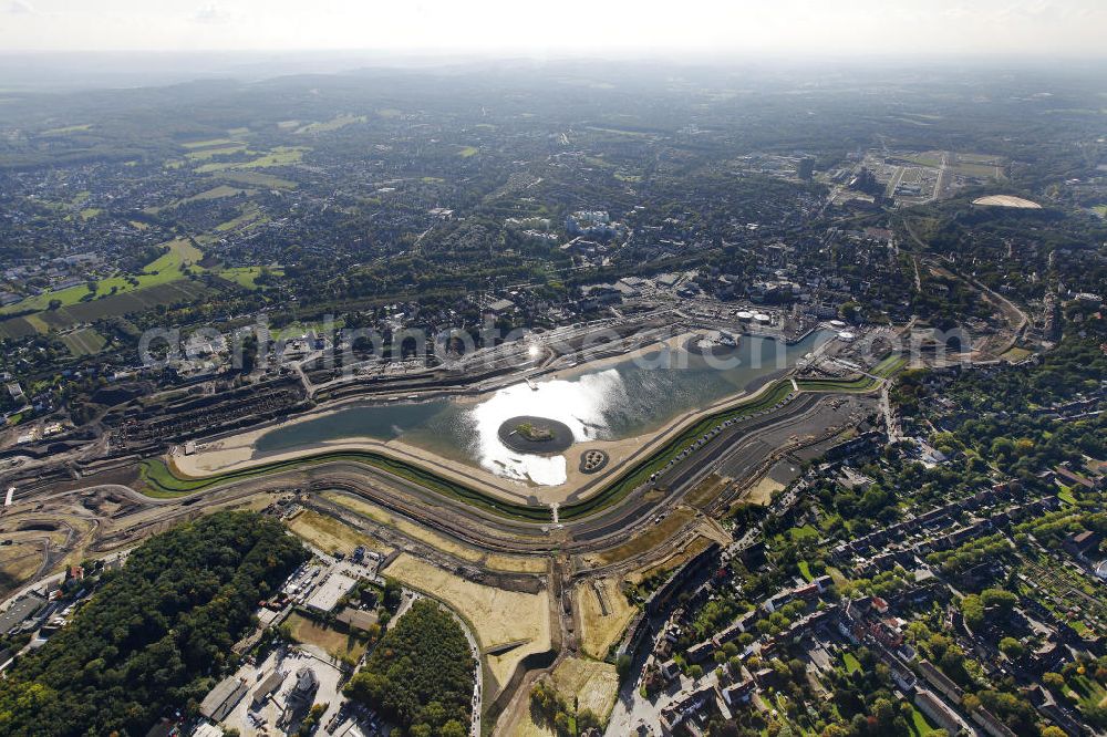 Dortmund from the bird's eye view: Beginn der Flutung des Phoenix-Sees im Stadtteil Hörde. Auf dem ehemaligen Gelände der Hermannshütte soll ein 24 Hektar großer See mit einer Länge von 1.230 Metern und einer Breite von 310 Metern entstehen. Beginning of the flooding of the lake Phoenix. On the former site of the ironworks Hermannshutte a 24 hectares large lake will be formed.