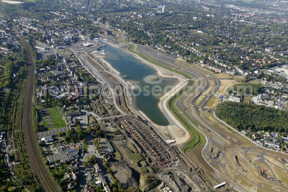 Aerial photograph Dortmund - Beginn der Flutung des Phoenix-Sees im Stadtteil Hörde. Auf dem ehemaligen Gelände der Hermannshütte soll ein 24 Hektar großer See mit einer Länge von 1.230 Metern und einer Breite von 310 Metern entstehen. Beginning of the flooding of the lake Phoenix. On the former site of the ironworks Hermannshutte a 24 hectares large lake will be formed.