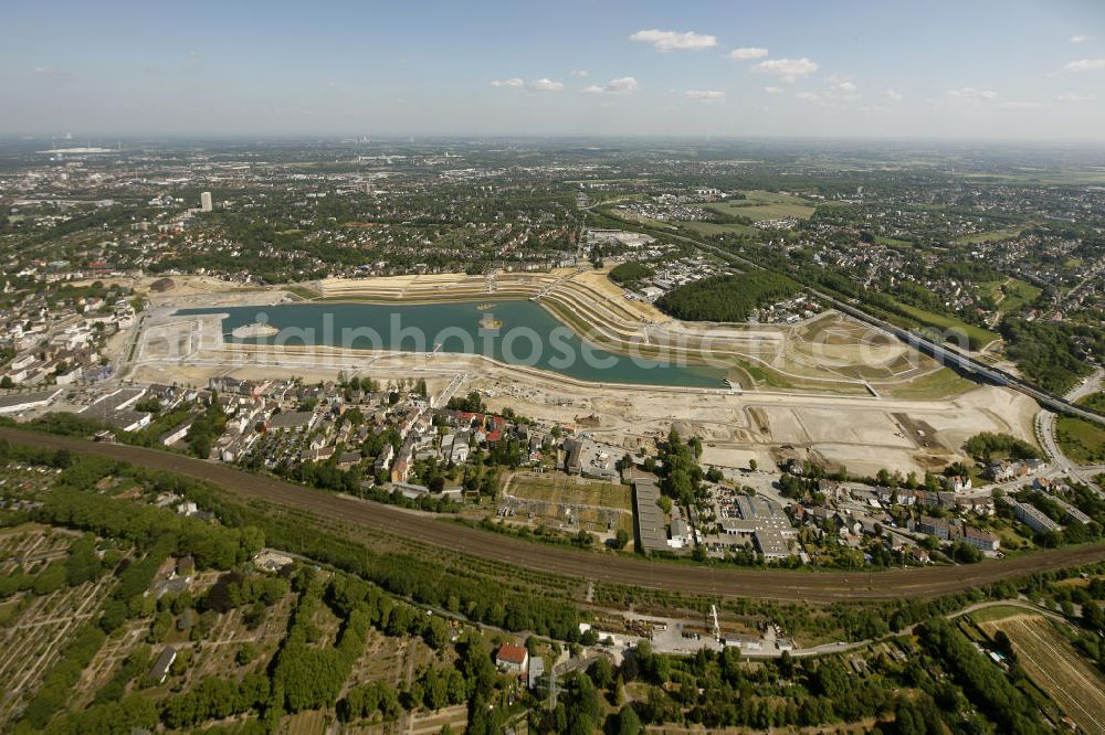 Dortmund Hörde from above - Aufnahme der Flutung der Phoenix-Sees im Stadtteil Hörde mit Fischaugenobjektiv. Auf dem ehemaligen Gelände der Hermannshütte soll ein 24 Hektar großer See mit einer Länge von 1.230 Metern und einer Breite von 310 Metern entstehen. The flooding of Lake Phoenix with fish-eye lens. On the former site of the ironworks Hermannhutte, a 24 hectares large lake will be formed.