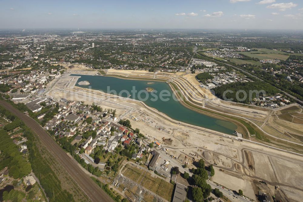 Dortmund Hörde from the bird's eye view: Aufnahme der Flutung der Phoenix-Sees im Stadtteil Hörde mit Fischaugenobjektiv. Auf dem ehemaligen Gelände der Hermannshütte soll ein 24 Hektar großer See mit einer Länge von 1.230 Metern und einer Breite von 310 Metern entstehen. The flooding of Lake Phoenix with fish-eye lens. On the former site of the ironworks Hermannhutte, a 24 hectares large lake will be formed.