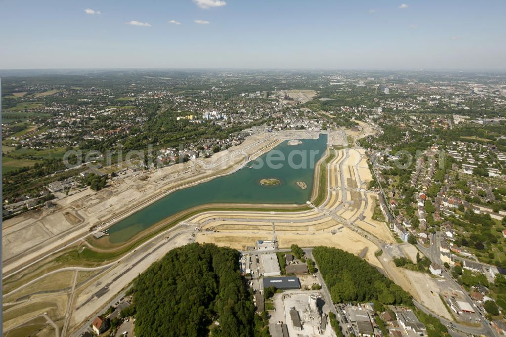 Aerial photograph Dortmund Hörde - Aufnahme der Flutung der Phoenix-Sees im Stadtteil Hörde mit Fischaugenobjektiv. Auf dem ehemaligen Gelände der Hermannshütte soll ein 24 Hektar großer See mit einer Länge von 1.230 Metern und einer Breite von 310 Metern entstehen. The flooding of Lake Phoenix with fish-eye lens. On the former site of the ironworks Hermannhutte, a 24 hectares large lake will be formed.