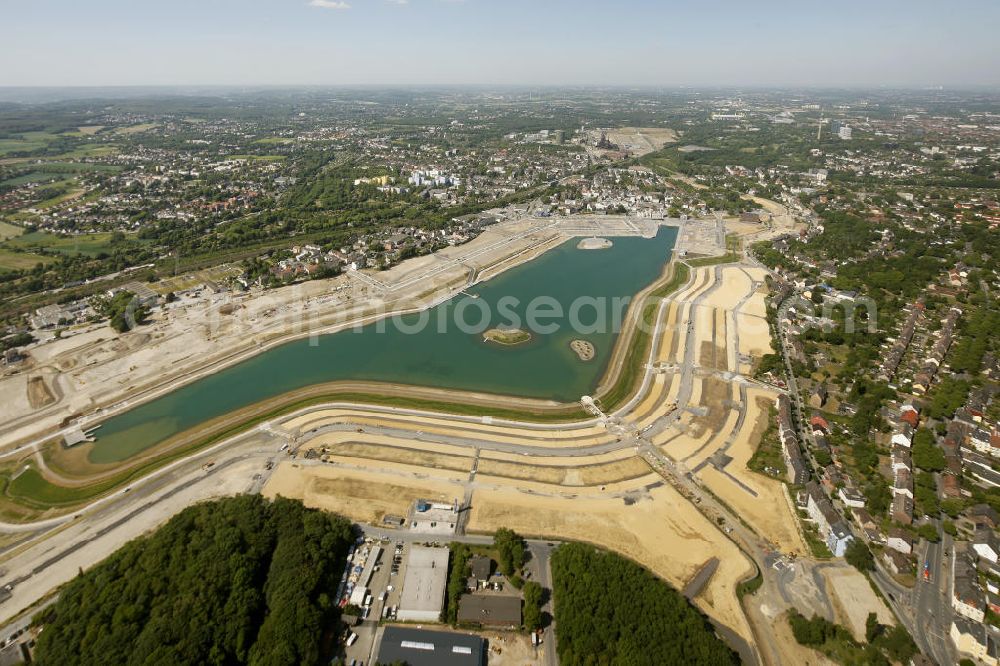 Dortmund Hörde from above - Aufnahme der Flutung der Phoenix-Sees im Stadtteil Hörde mit Fischaugenobjektiv. Auf dem ehemaligen Gelände der Hermannshütte soll ein 24 Hektar großer See mit einer Länge von 1.230 Metern und einer Breite von 310 Metern entstehen. The flooding of Lake Phoenix with fish-eye lens. On the former site of the ironworks Hermannhutte, a 24 hectares large lake will be formed.