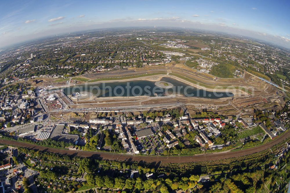 Dortmund from above - Aufnahme der Flutung der Phoenix-Sees im Stadtteil Hörde mit Fischaugenobjektiv. Auf dem ehemaligen Gelände der Hermannshütte soll ein 24 Hektar großer See mit einer Länge von 1.230 Metern und einer Breite von 310 Metern entstehen. The flooding of Lake Phoenix with fish-eye lens. On the former site of the ironworks Hermannhutte, a 24 hectares large lake will be formed.