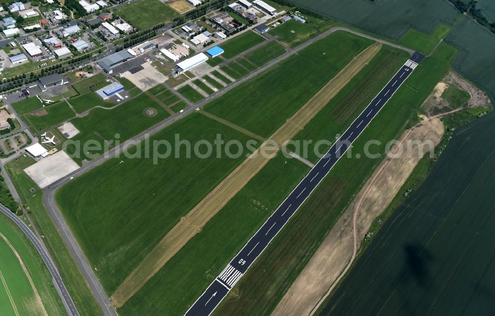 Magdeburg from the bird's eye view: Runway with tarmac terrain of airfield FMB Flugplatz Magdeburg Betriebsgesellschaft mbH in Magdeburg in the state Saxony-Anhalt