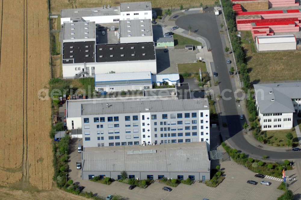 Aerial image Köln - Ford Trainingszentrum Köln-Feldkassel im Gewerbegebiet Feldkassel. Das Gebäude hat eine Grundfläche von 1700qm und eine Kapazität von 72 Parkplätzen. Adresse: Oskar-Schindler-Straße 9, 50769 Köln-Feldkassel, Tel. +49(0)221 79100-100, Fax +49(0)221 79100-255 ; Vermietung / Verwaltung: Unternehmensgruppe Markus Gerold, An der Vaerstbrücke 1, 59425 Unna, Tel. +49(0)2303 25036-26, Fax +49(0)2303 25036-27, E-Mail: info@markus-gerold.de