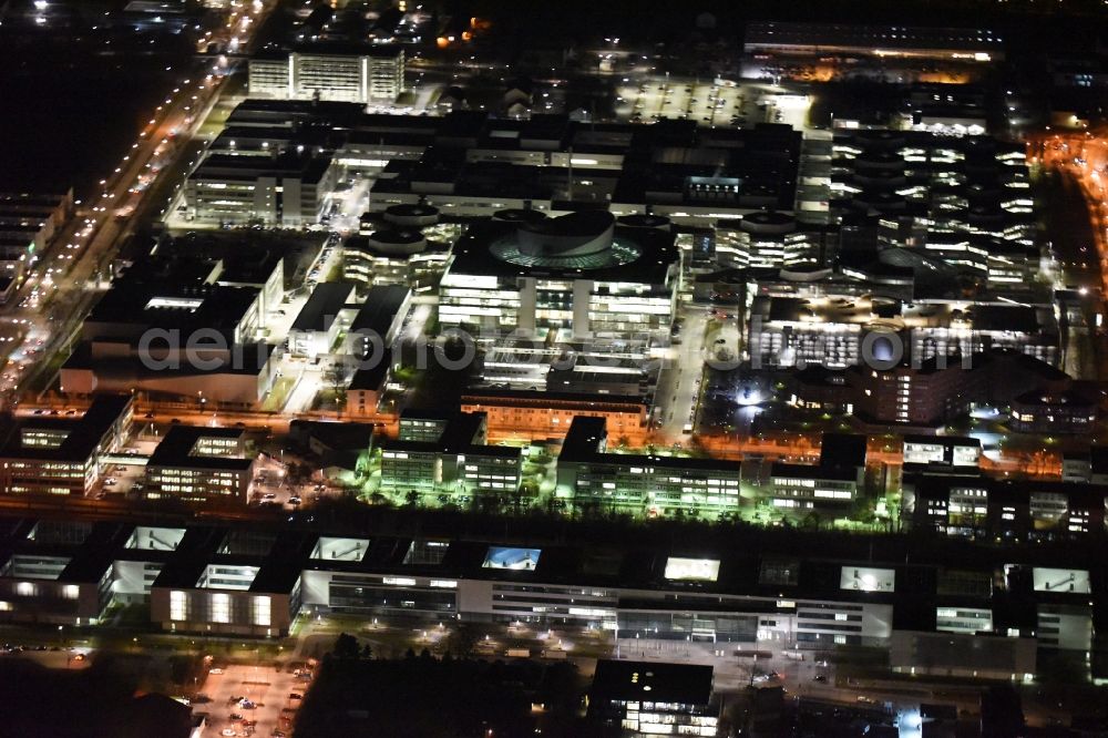 Aerial image München - Night view Research building and office complex BMW Group Forschungs- und Innovationszentrum FIZ on Knorrstrasse in Munich in the state Bavaria