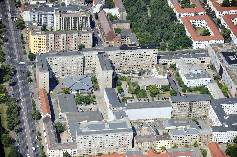 Aerial image Berlin - Blick auf die Forschungs- und Gedenkstätte Normannenstraße / Ruschestrasse, der ehemaligen Zentrale des Ministeriums für Staatssicherheit ( MfS ). Sie ist eine Forschungs- und Gedenkstätte zum politischen System der DDR. Die Ausstellung umfasst die Amts- und Arbeitsräume des ehemaligen Ministers für Staatssicherheit Erich Mielke. Träger ist der Verein Antistalinistische Aktion Berlin-Normannenstraße e. V. (ASTAK), die im Sommer 1990 von Bürgerrechtlern in Berlin gegründet wurde. Ihr Ziel ist die Förderung des Aufbaus der Gedenkstätte als Zentrum zur Sammlung, Bewahrung, Dokumentation, Aufarbeitung und Ausstellung von Sachzeugnissen sowie themenbezogener Forschungsarbeit zur DDR. View of the former headquarters of the Ministry for State Security (Stasi) of the GDR.