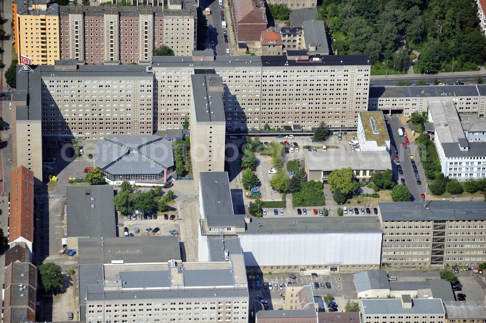 Aerial image Berlin - Blick auf die Forschungs- und Gedenkstätte Normannenstraße / Ruschestrasse, der ehemaligen Zentrale des Ministeriums für Staatssicherheit ( MfS ). Sie ist eine Forschungs- und Gedenkstätte zum politischen System der DDR. Die Ausstellung umfasst die Amts- und Arbeitsräume des ehemaligen Ministers für Staatssicherheit Erich Mielke. Träger ist der Verein Antistalinistische Aktion Berlin-Normannenstraße e. V. (ASTAK), die im Sommer 1990 von Bürgerrechtlern in Berlin gegründet wurde. Ihr Ziel ist die Förderung des Aufbaus der Gedenkstätte als Zentrum zur Sammlung, Bewahrung, Dokumentation, Aufarbeitung und Ausstellung von Sachzeugnissen sowie themenbezogener Forschungsarbeit zur DDR. View of the former headquarters of the Ministry for State Security (Stasi) of the GDR.