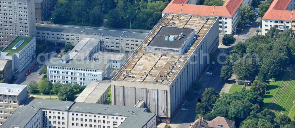 Berlin Lichtenberg from above - Blick auf die Forschungs- und Gedenkstätte Normannenstraße / Ruschestrasse, der ehemaligen Zentrale des Ministeriums für Staatssicherheit ( MfS ). Sie ist eine Forschungs- und Gedenkstätte zum politischen System der DDR. Die Ausstellung umfasst die Amts- und Arbeitsräume des ehemaligen Ministers für Staatssicherheit Erich Mielke. Träger ist der Verein Antistalinistische Aktion Berlin-Normannenstraße e. V. (ASTAK), die im Sommer 1990 von Bürgerrechtlern in Berlin gegründet wurde. Ihr Ziel ist die Förderung des Aufbaus der Gedenkstätte als Zentrum zur Sammlung, Bewahrung, Dokumentation, Aufarbeitung und Ausstellung von Sachzeugnissen sowie themenbezogener Forschungsarbeit zur DDR. View of the former headquarters of the Ministry for State Security (Stasi) of the GDR.