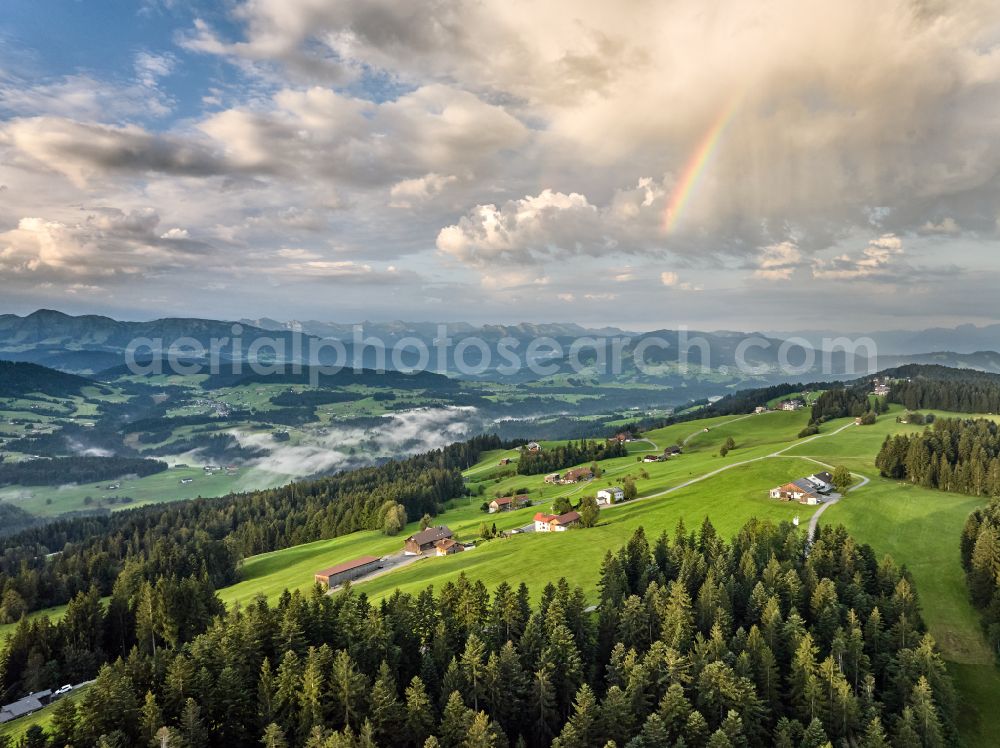 Aerial photograph Sulzberg - Forest areas in with meadow landscape on street Dorf in Sulzberg in Vorarlberg, Austria