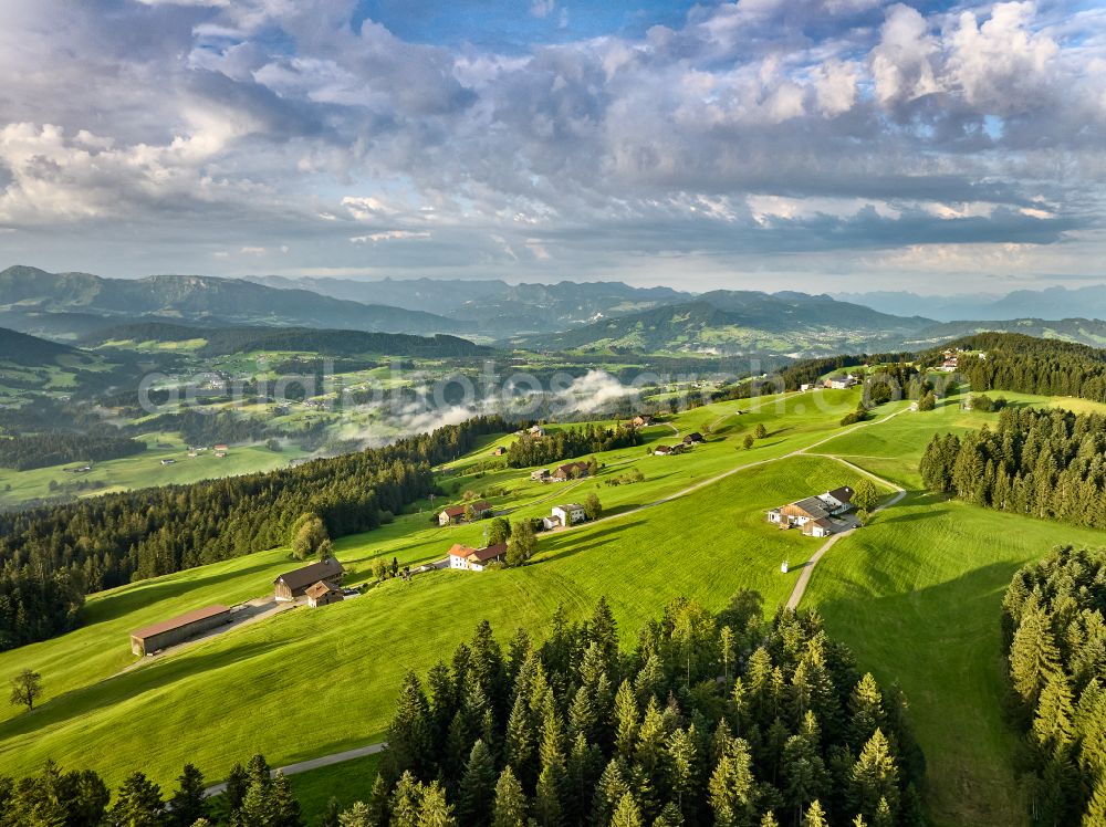 Sulzberg from above - Forest areas in with meadow landscape on street Dorf in Sulzberg in Vorarlberg, Austria