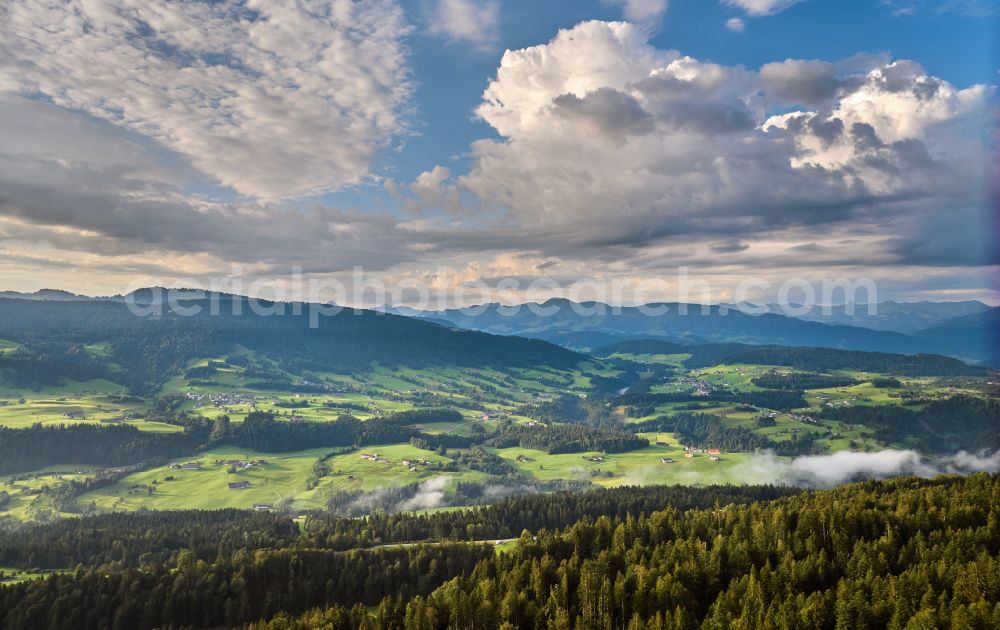 Aerial image Sulzberg - Forest areas in with meadow landscape on street Dorf in Sulzberg in Vorarlberg, Austria