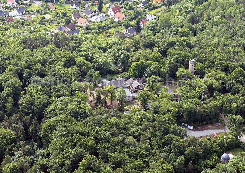 Aerial image Jena - The forester's house with forest tower in Jena in Thuringia is located in the forest recreation area in the west of the university city. The forester's house is a traditional restaurant and a popular hiking destination. From standing next to forest tower, visitors have a magnificent view of the city of Jena and the wooded surroundings