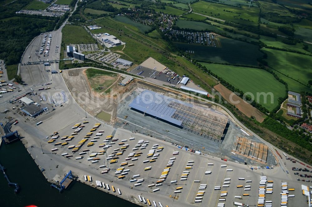 Travemünde from the bird's eye view: Construction site of building complex and distribution center on the site of Terminal Skandinavienkai in the district Ivendorf in Travemuende in the state Schleswig-Holstein, Germany