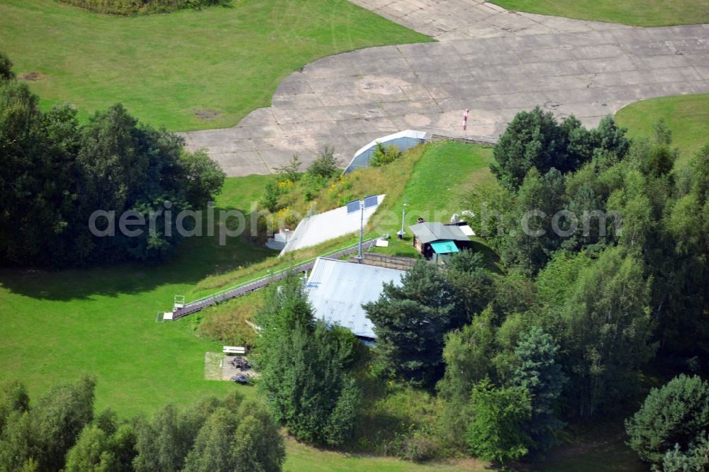 Werneuchen from the bird's eye view: View at for recreation and leisure converted former airplane shelter at the airfield in Werneuchen in the federal state of Brandenburg