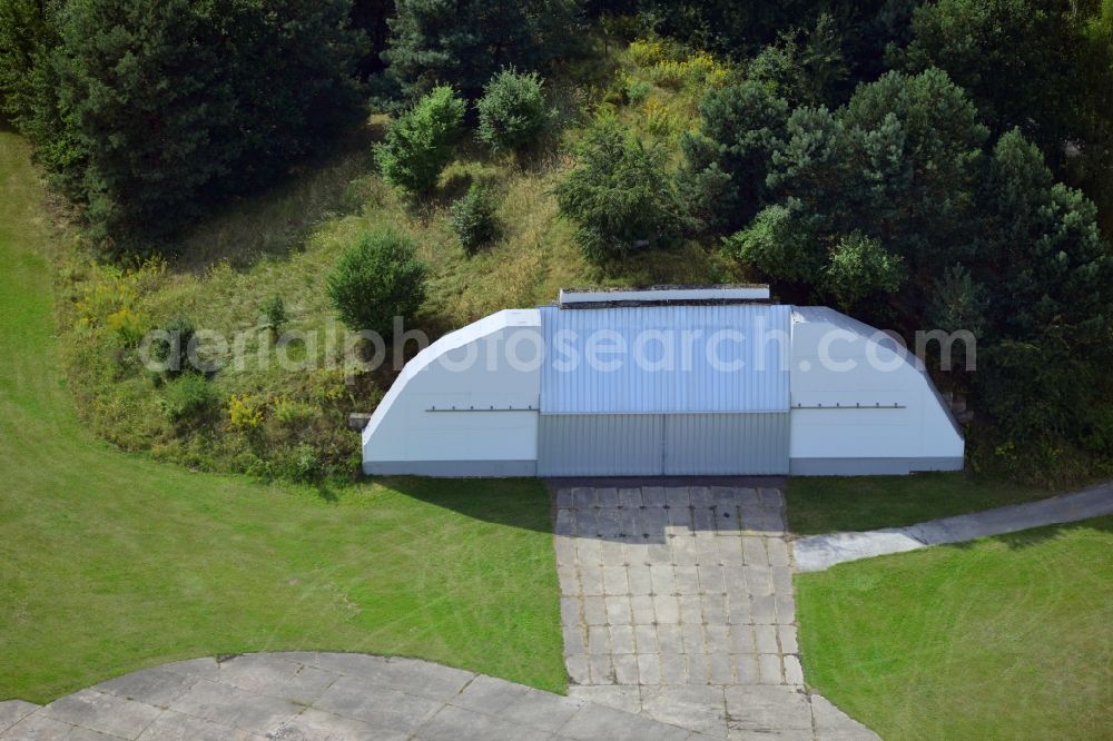 Aerial image Werneuchen - View at for recreation and leisure converted former airplane shelter at the airfield in Werneuchen in the federal state of Brandenburg