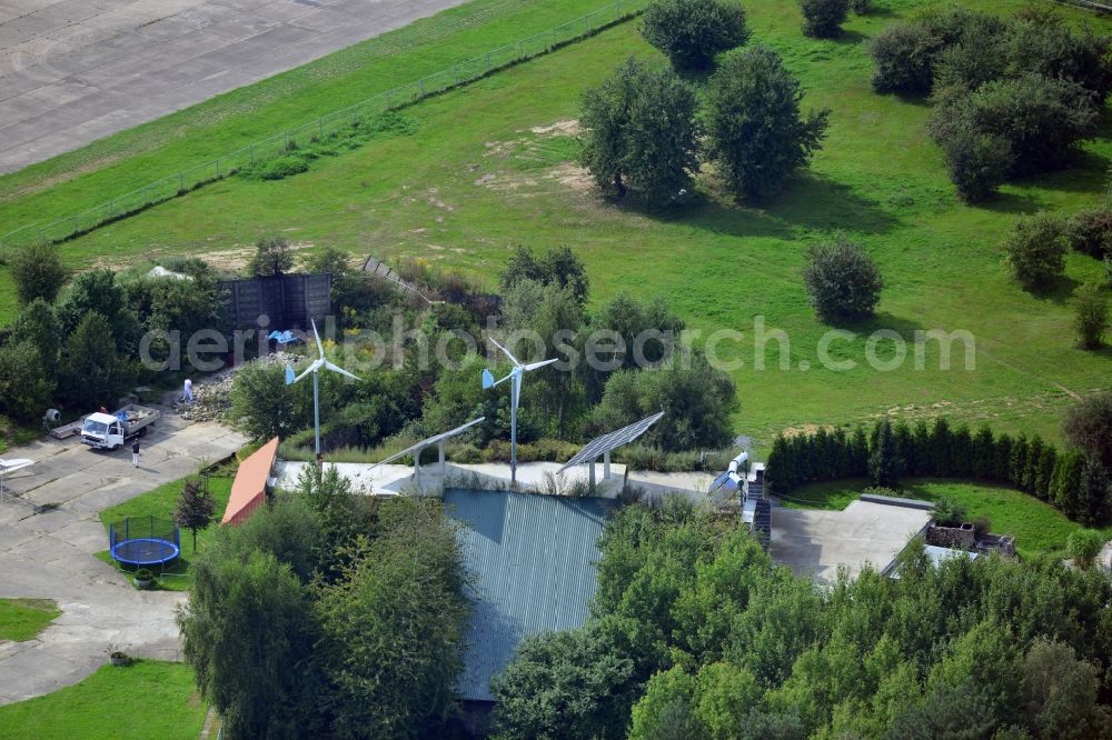 Aerial photograph Werneuchen - View at for recreation and leisure converted former airplane shelter at the airfield in Werneuchen in the federal state of Brandenburg