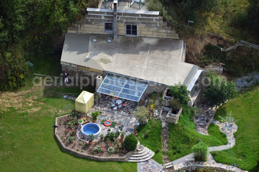 Aerial image Werneuchen - View at for recreation and leisure converted former airplane shelter at the airfield in Werneuchen in the federal state of Brandenburg