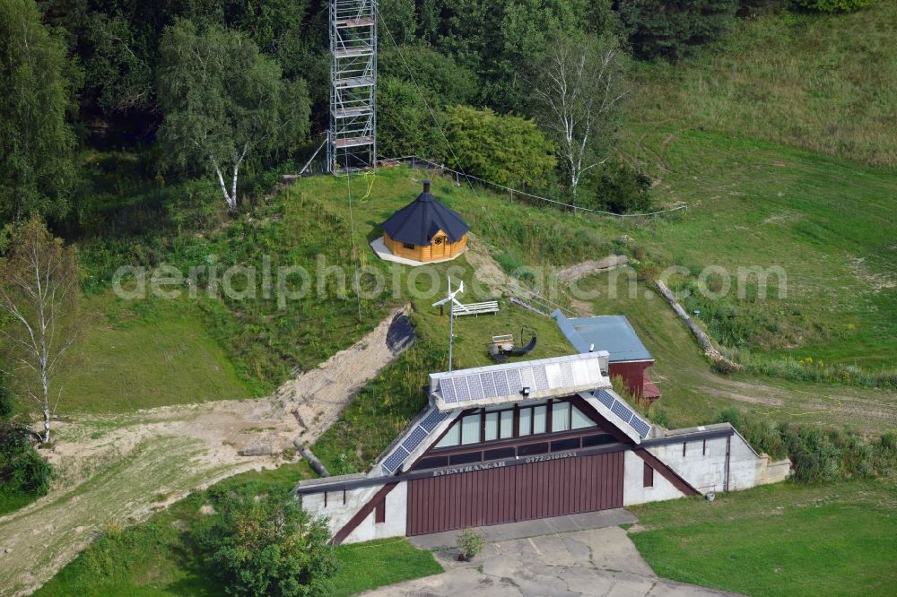 Aerial photograph Werneuchen - View at for recreation and leisure converted former airplane shelter at the airfield in Werneuchen in the federal state of Brandenburg