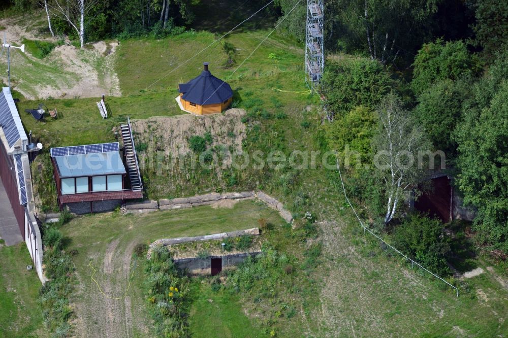 Aerial image Werneuchen - View at for recreation and leisure converted former airplane shelter at the airfield in Werneuchen in the federal state of Brandenburg