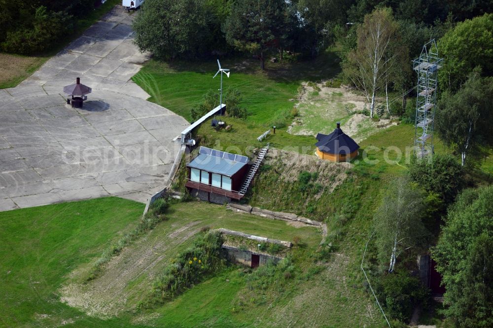 Werneuchen from above - View at for recreation and leisure converted former airplane shelter at the airfield in Werneuchen in the federal state of Brandenburg