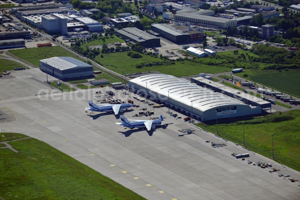 Schkeuditz from the bird's eye view: Cargo aircraft Antonov AN-124 Volga Dnepr cargo airline - charter company on the terminal at the airport in Schkeuditz in Saxony