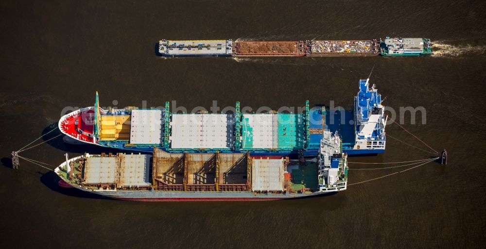 Hamburg from above - Cargo ships and bulk carriers moored in the harbor der Elbe in Hamburg in Germany