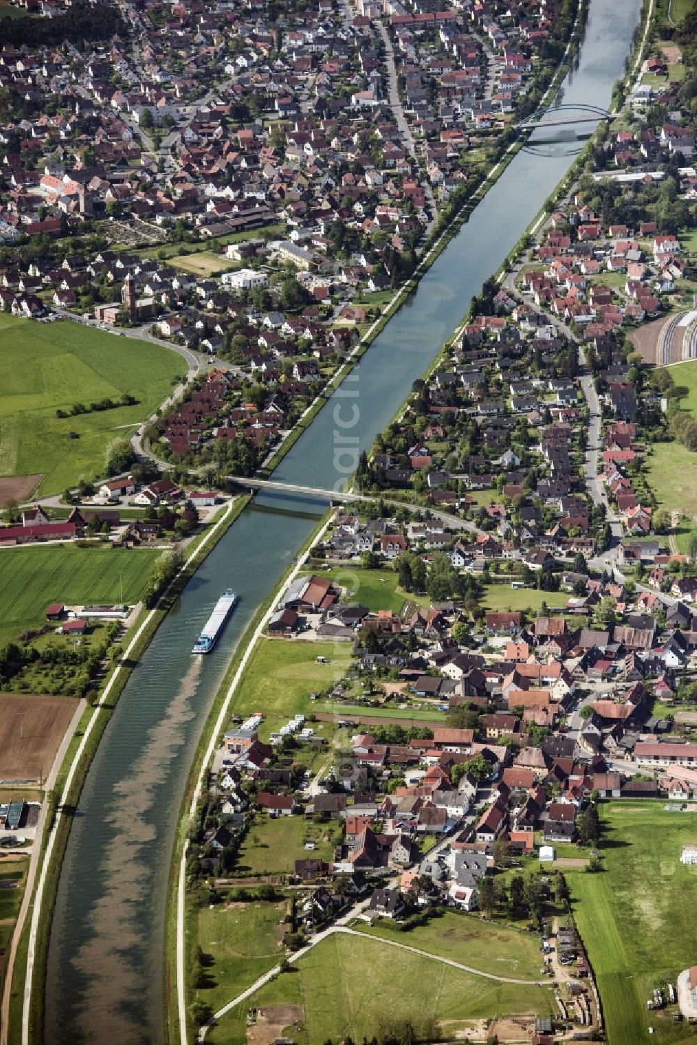 Aerial image Möhrendorf - Cargo ships and bulk carriers on the inland shipping waterway of the river course of Seebach in Moehrendorf in the state Bavaria, Germany