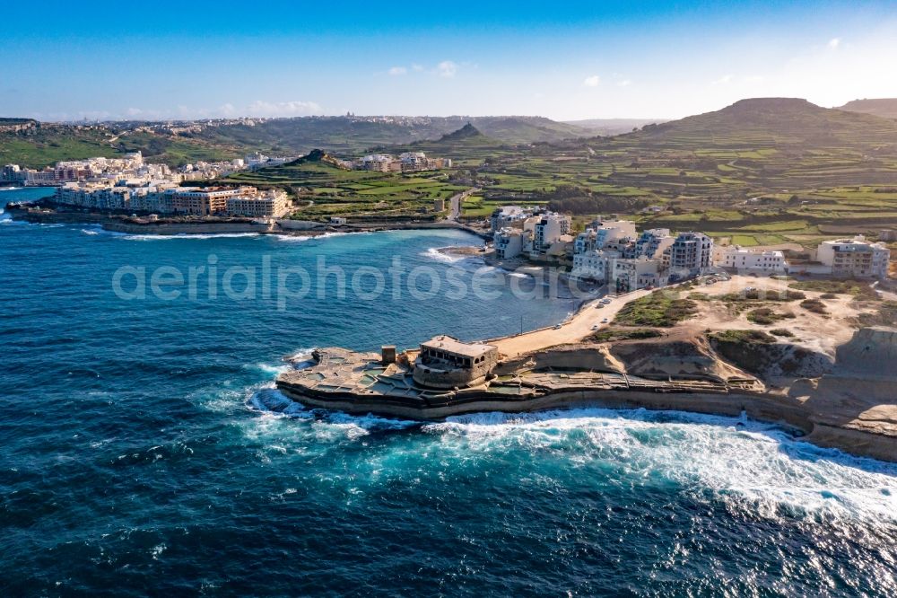 Marsalforn from above - Fragments of the fortress Qolla l-Bajda Battery in Marsalforn in Gozo, Malta