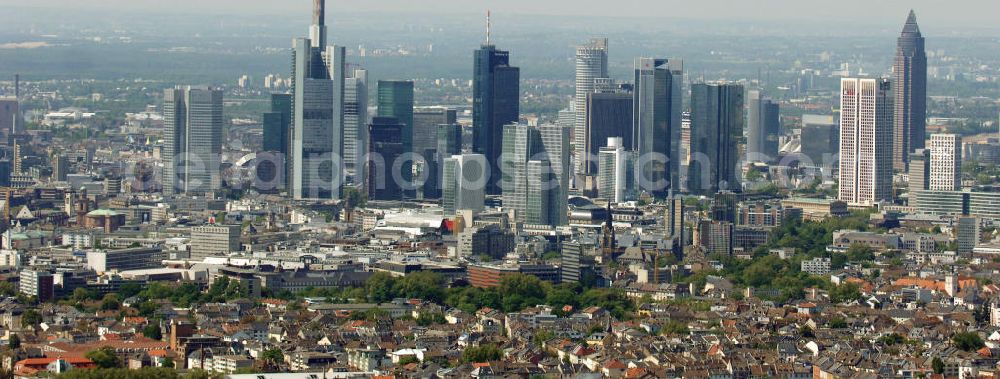 Frankfurt am Main from above - Blick auf die Frankfurter Skyline am Main. Das Frankfurter Banken-, und Bürohauszentrum reiht die Mainmetropole in die Liste typische europäischer Hochhausstädte ein. View of the Frankfurt am Main skyline. The Frankfurt banking, and office center joins a list of the main metropolis in the typical high-rise European citys.